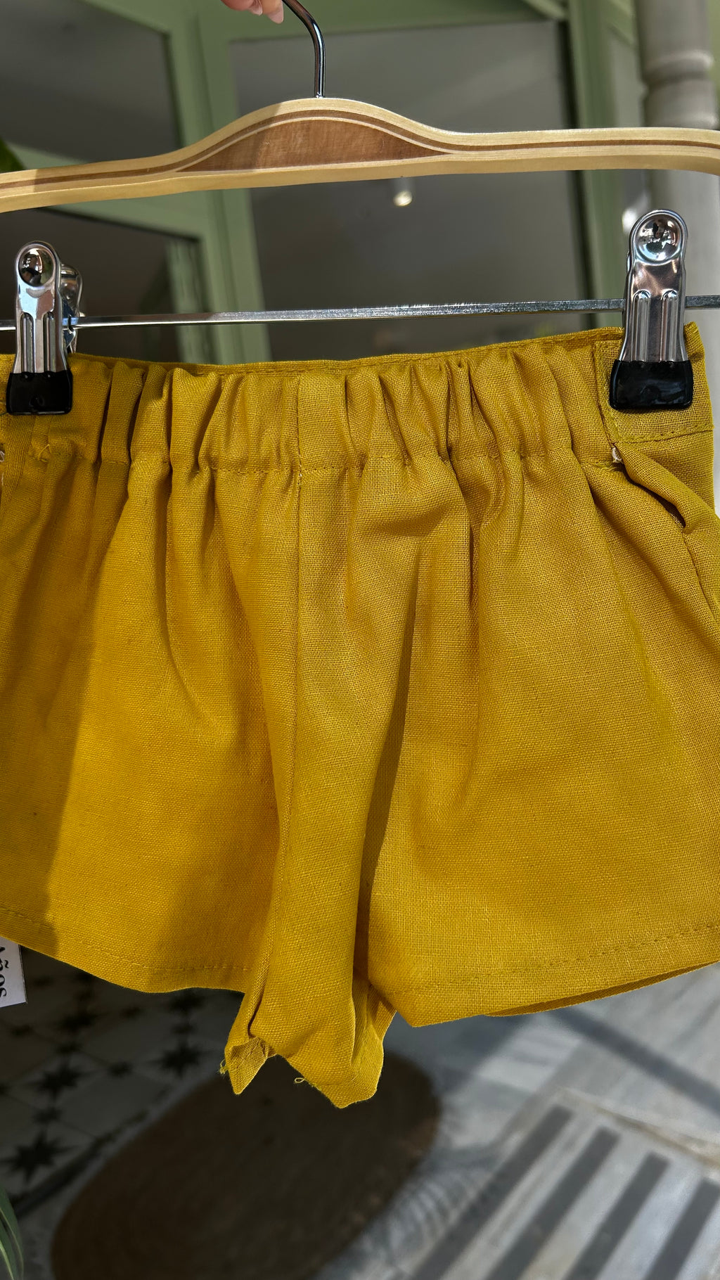 PANTALÓN CORTÓ MOSTAZA