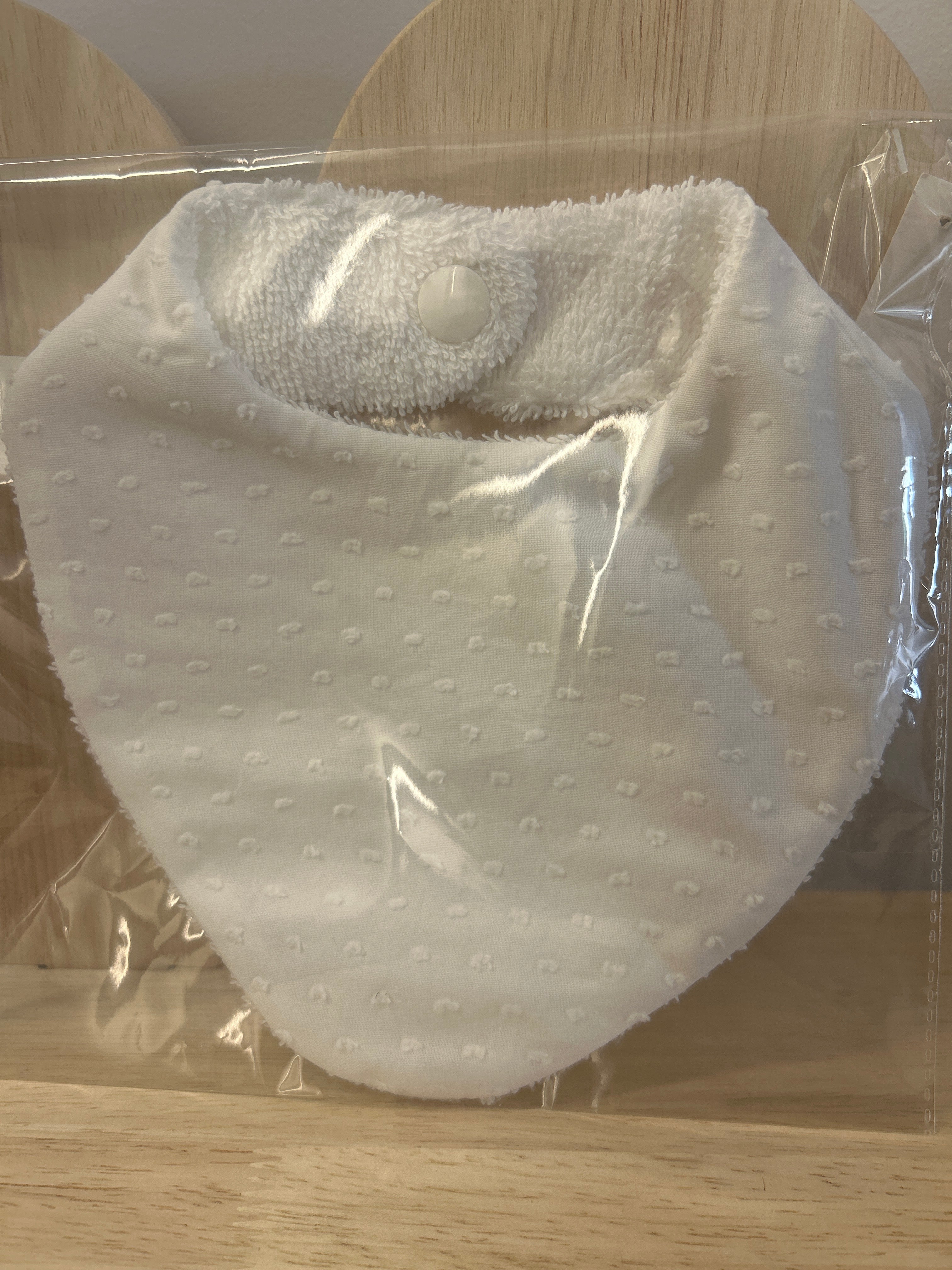 Babero plumeti blanco