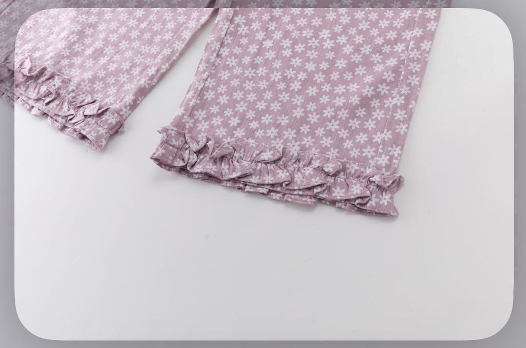 Conjunto niña flores malva