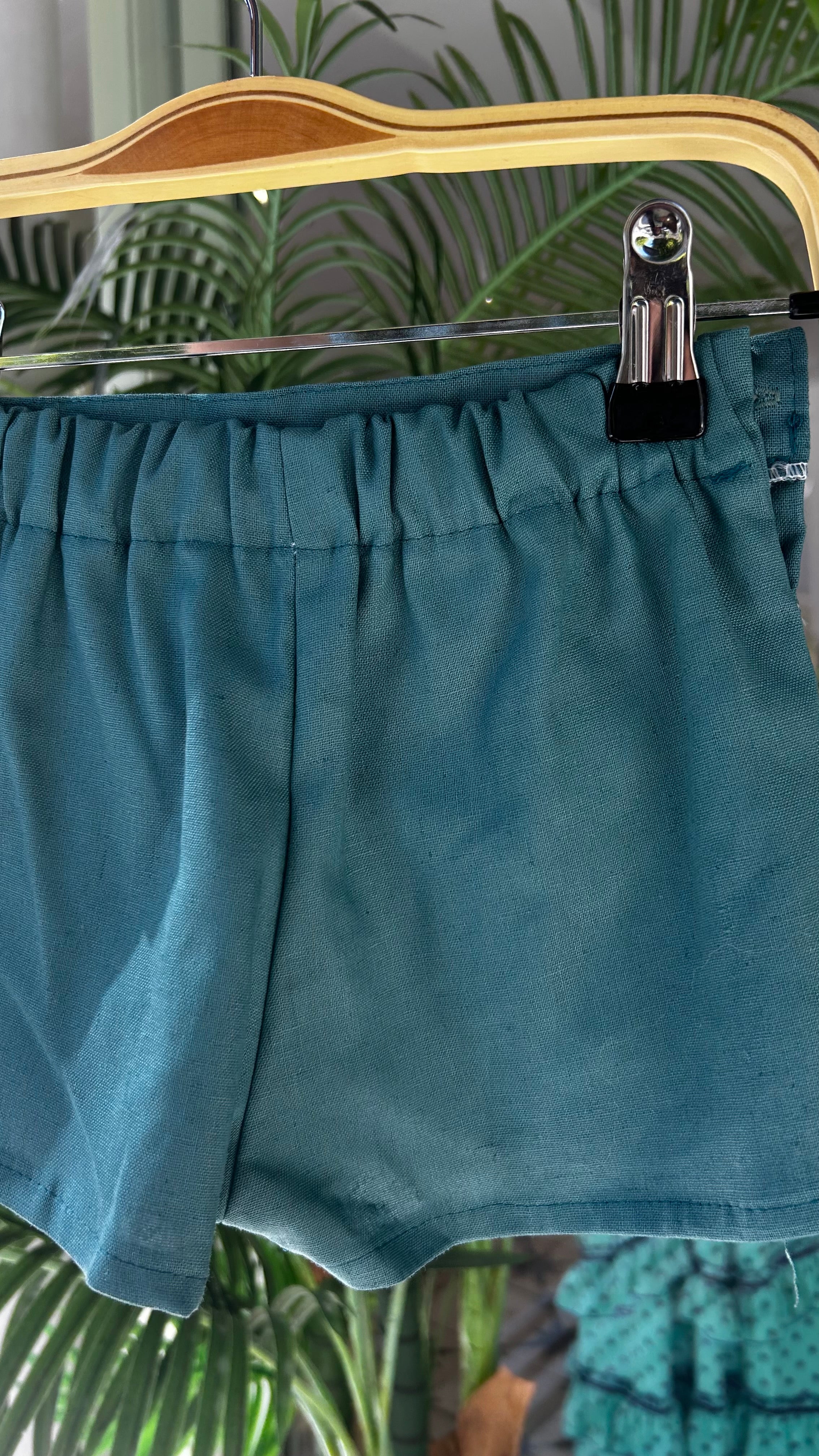 PANTALÓN CORTÓ VERDE PETRÓLEO
