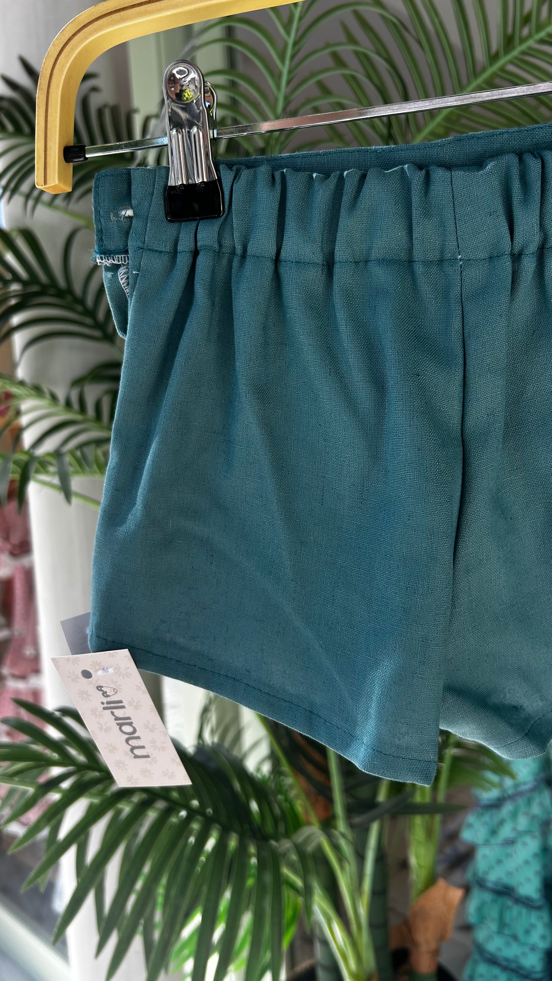 PANTALÓN CORTÓ VERDE PETRÓLEO