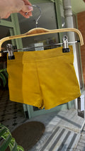 PANTALÓN CORTÓ MOSTAZA